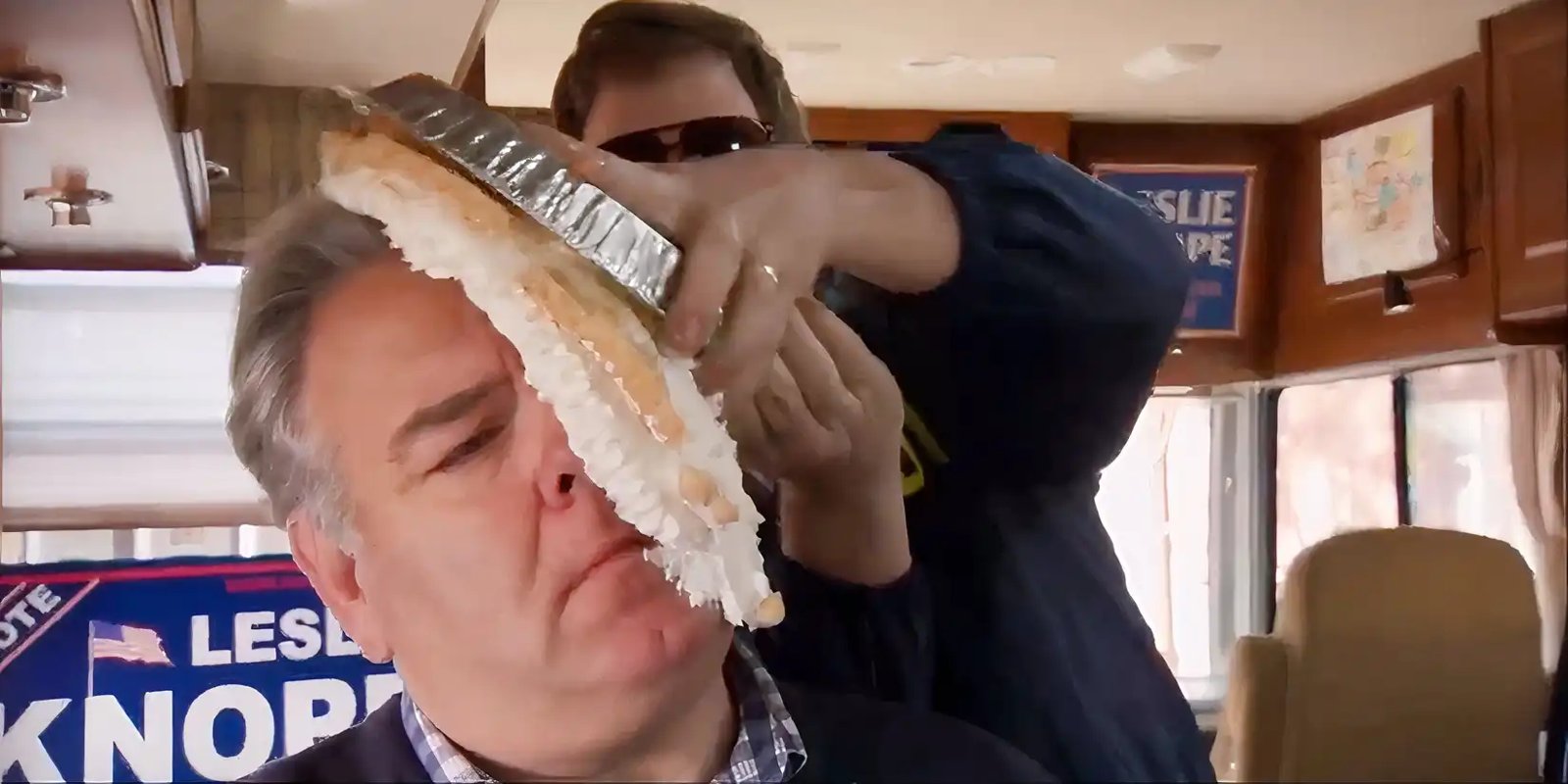 Andy smearing a pie on Jerry's face in Parks and Rec